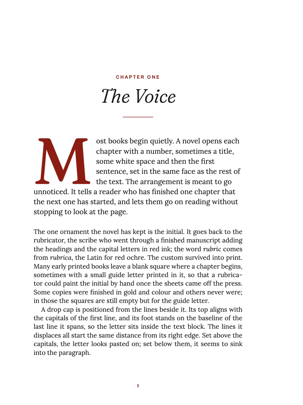 Opening page 1: The Voice. Chapter One, “The Voice”: a small red tracked kicker, a light italic title, a short red rule and an opening paragraph whose five-line red initial M meets the first line's capitals.